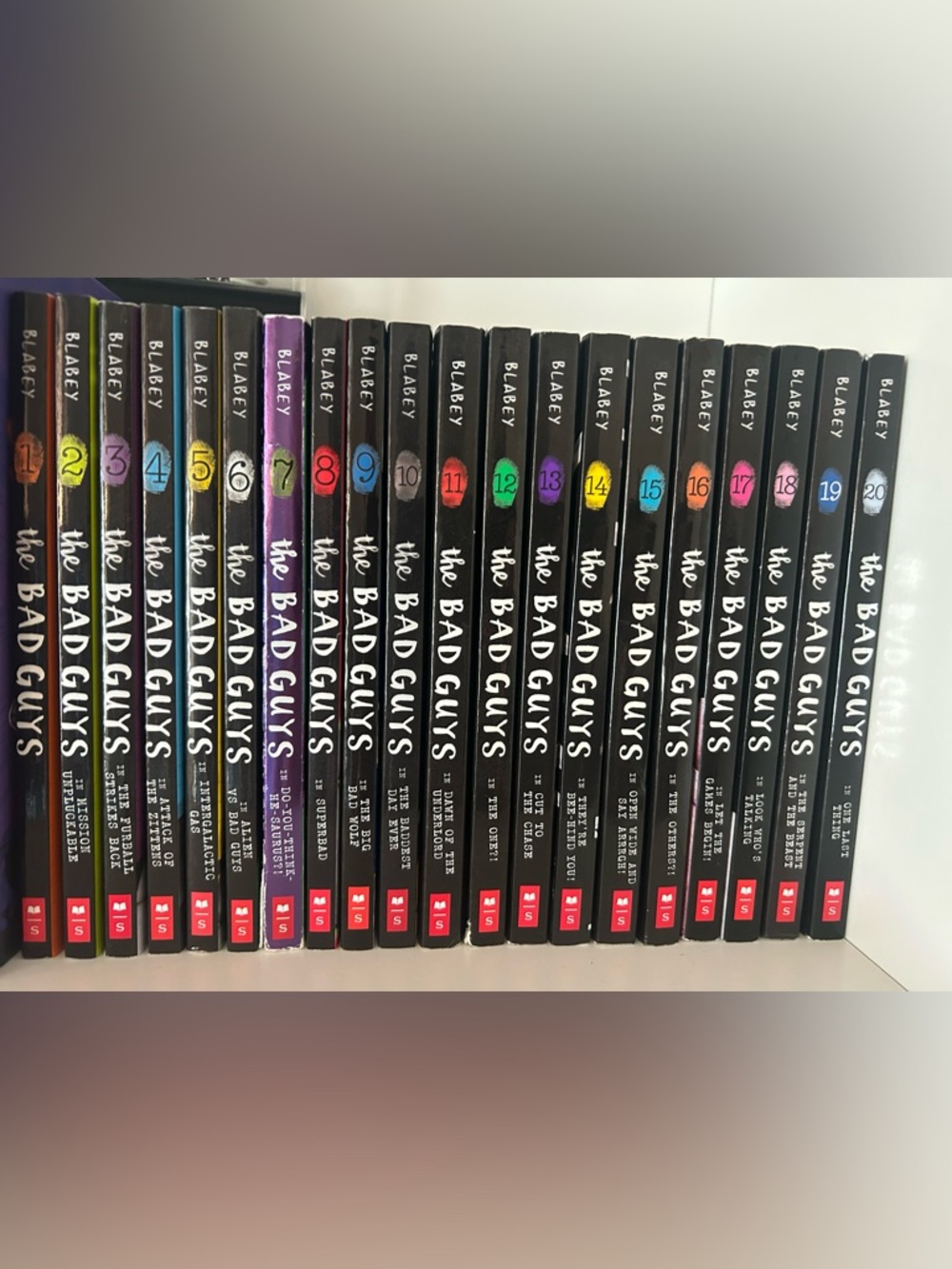 The Bad Guys paperback book set - black spines with colorful number accents